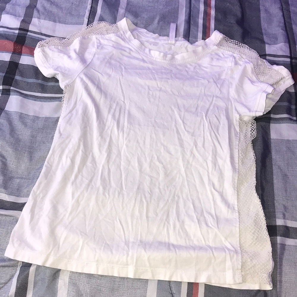 White workout top with fishnet down the sides